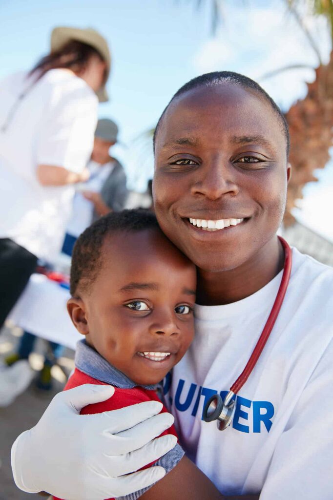 portrait of a caring volunteer doctor giving check 2023 11 27 05 19 52 utc